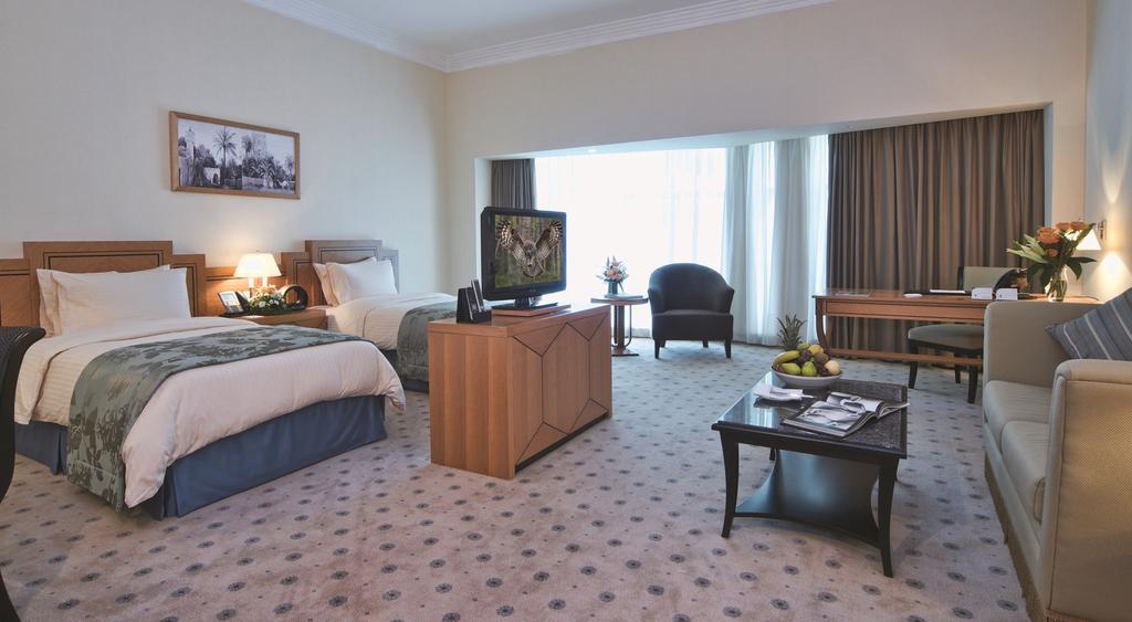 Wiseman Grand Hotel Doha Buitenkant foto A room at the hotel