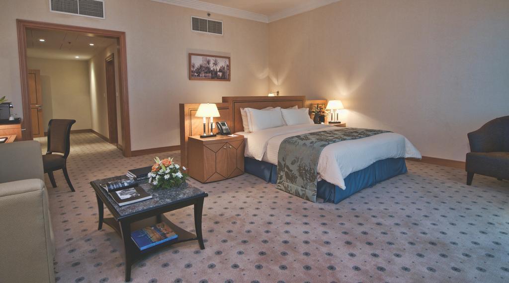 Wiseman Grand Hotel Doha Buitenkant foto A bedroom at the Grand Hyatt Hotel, Amman, Jordan